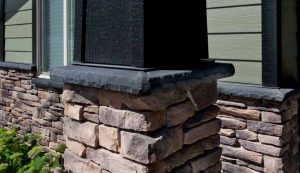 StoneTransitions® - Watertable Sill, Rockfaced - Coal