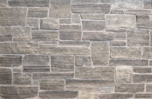 Colonial Brick & Stone - Split Face Ledgerock, Tigerstripe with half inch mortar joints