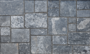 Pangaea® Natural Stone – Castlestone, Black Rundle with half inch mortar joints