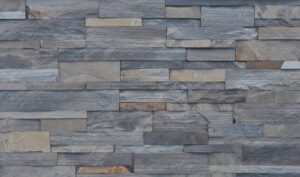 Pangaea® Natural Stone - Terrain Formfit Ledgestone, Copper Canyon avec joints de mortier serrés