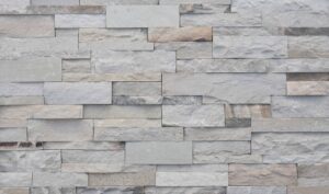 Pangaea® Natural Stone - Terrain Formfit Ledgestone, Tuscan avec joints de mortier serrés