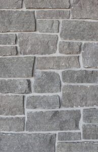 ThinCut™ Natural Stone - Random Height, Blue River with half inch mortar joints